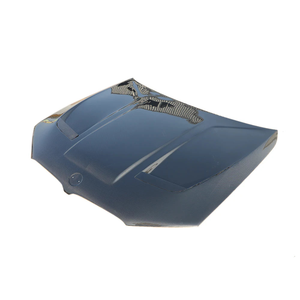 BMW F90 M5 carbon fiber engine hood three-quarter view