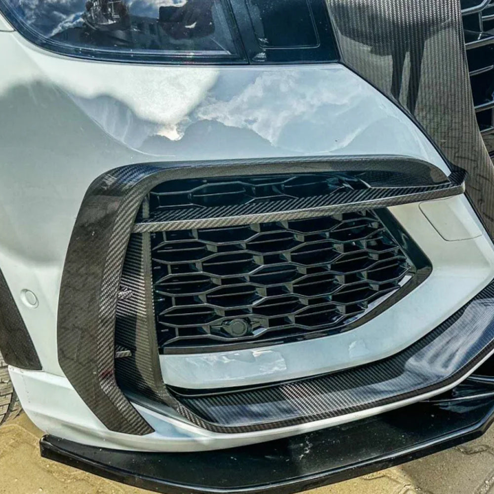Audi RS Q8 carbon fiber front bumper vent trims installed