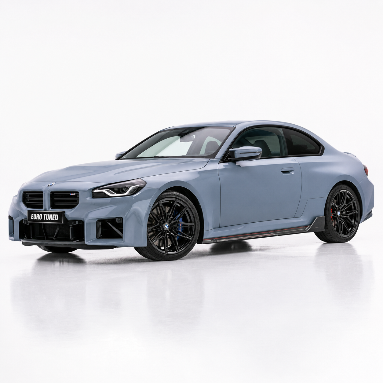 BMW M2 G87 carbon fiber side skirt extensions installed side view