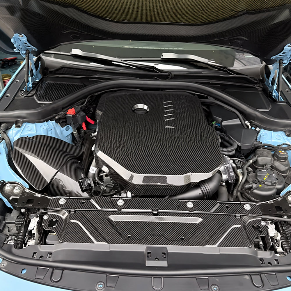 BMW M440i G22 G23 G26 B58 Gen 2 carbon fiber intake system installed in the engine bay