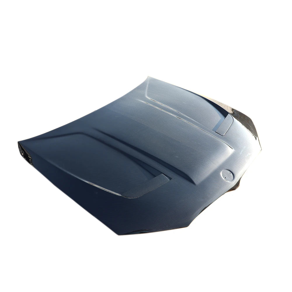 BMW M5 F90 gloss carbon fiber hood top angle