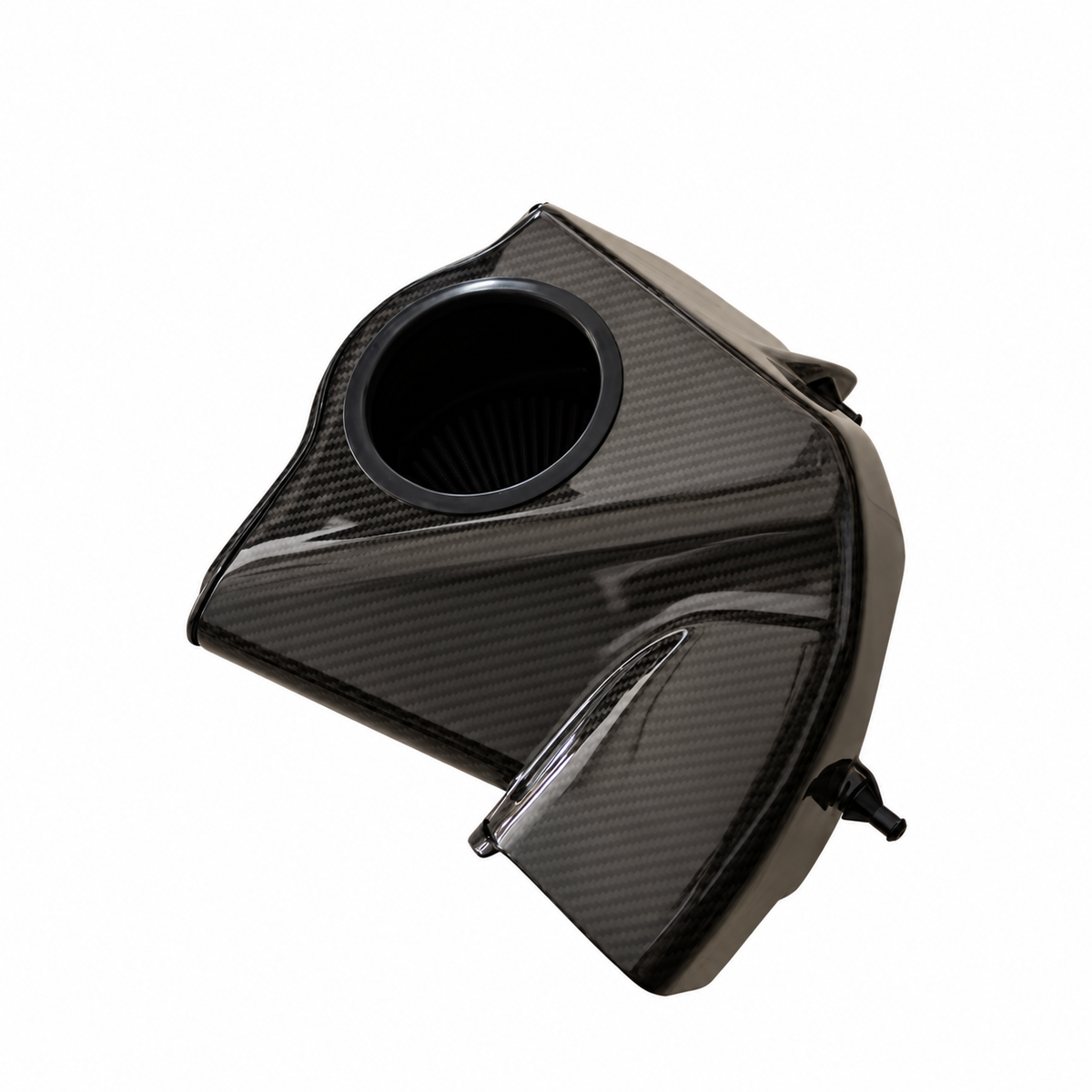 BMW M5 F90 S63 carbon fiber intake airbox detail with large inlet opening and gloss carbon weave