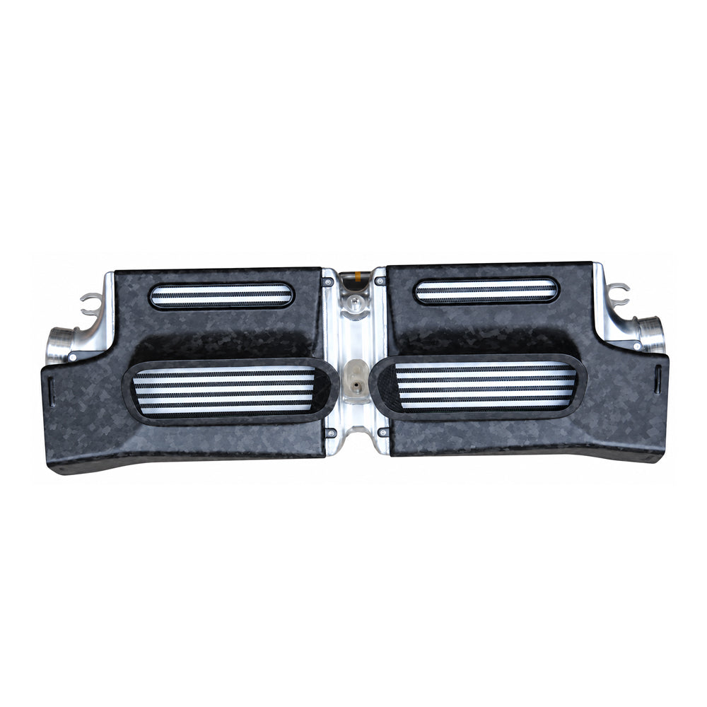 Porsche 992 Turbo performance intercooler rear view with carbon fiber shield and exposed cooling core